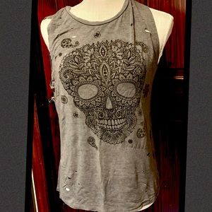 Skeleton muscle tee with tears in the fabric. Loose fit. Comfortable cotton.